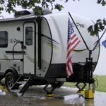 Camper parked alone at a quiet campsite where our remote storage door alerts come in handy