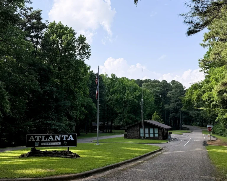 Main entrance and road leading into Atlanta State Park in Texas.