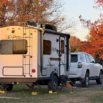 Flagstaff E-Pro 15TB camper trailer parked at a rest stop for a quick overnight stay.