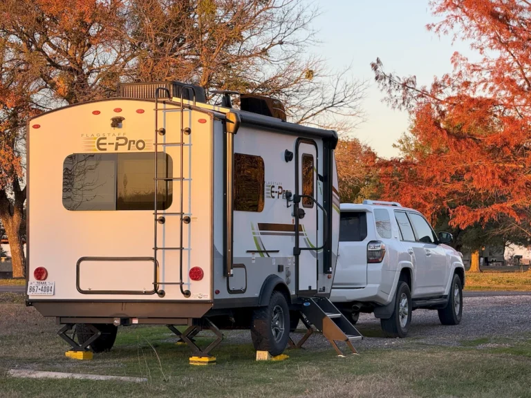 Flagstaff E-Pro 15TB camper trailer parked at a rest stop for a quick overnight stay.