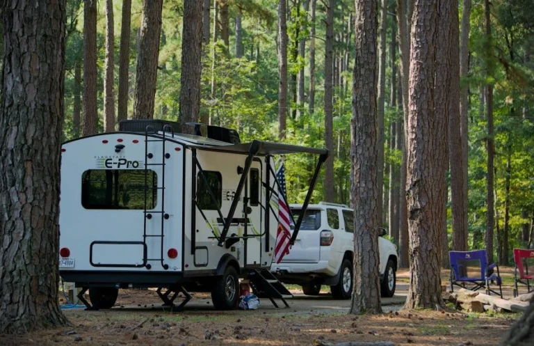 Toyota 4Runner and Flagstaff E-Pro parked at Clear Springs Park among pine trees