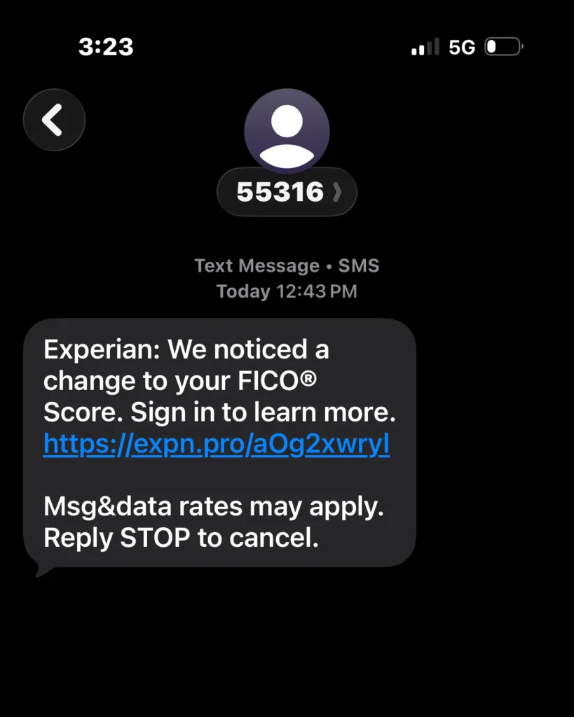 A screenshot of a mobile phone text message scam posing as an Experian FICO score alert with a phishing link to expn.pro
