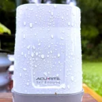 The wireless Acurite 899 rain gauge mounted outdoors as part of a custom DIY weather sensors setup.